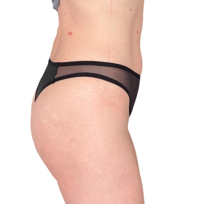 Tanga menstrual negro